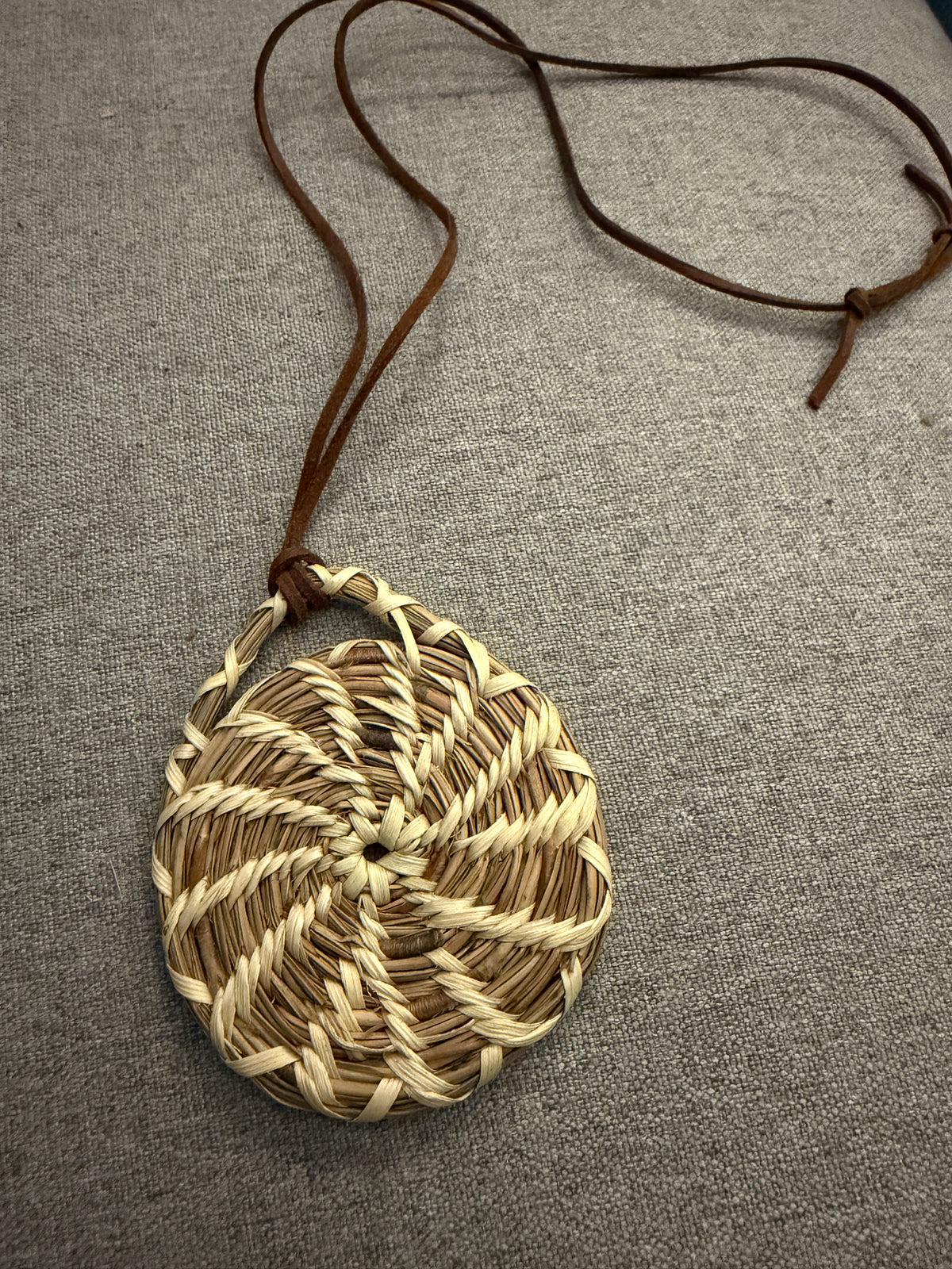Coulter pine pendant with palm necklace from Baja California (A)