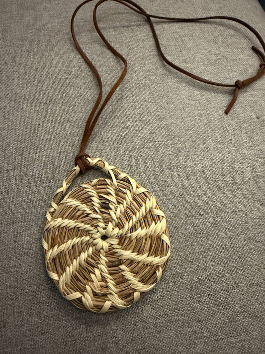 Coulter pine pendant with palm necklace from Baja California (A)